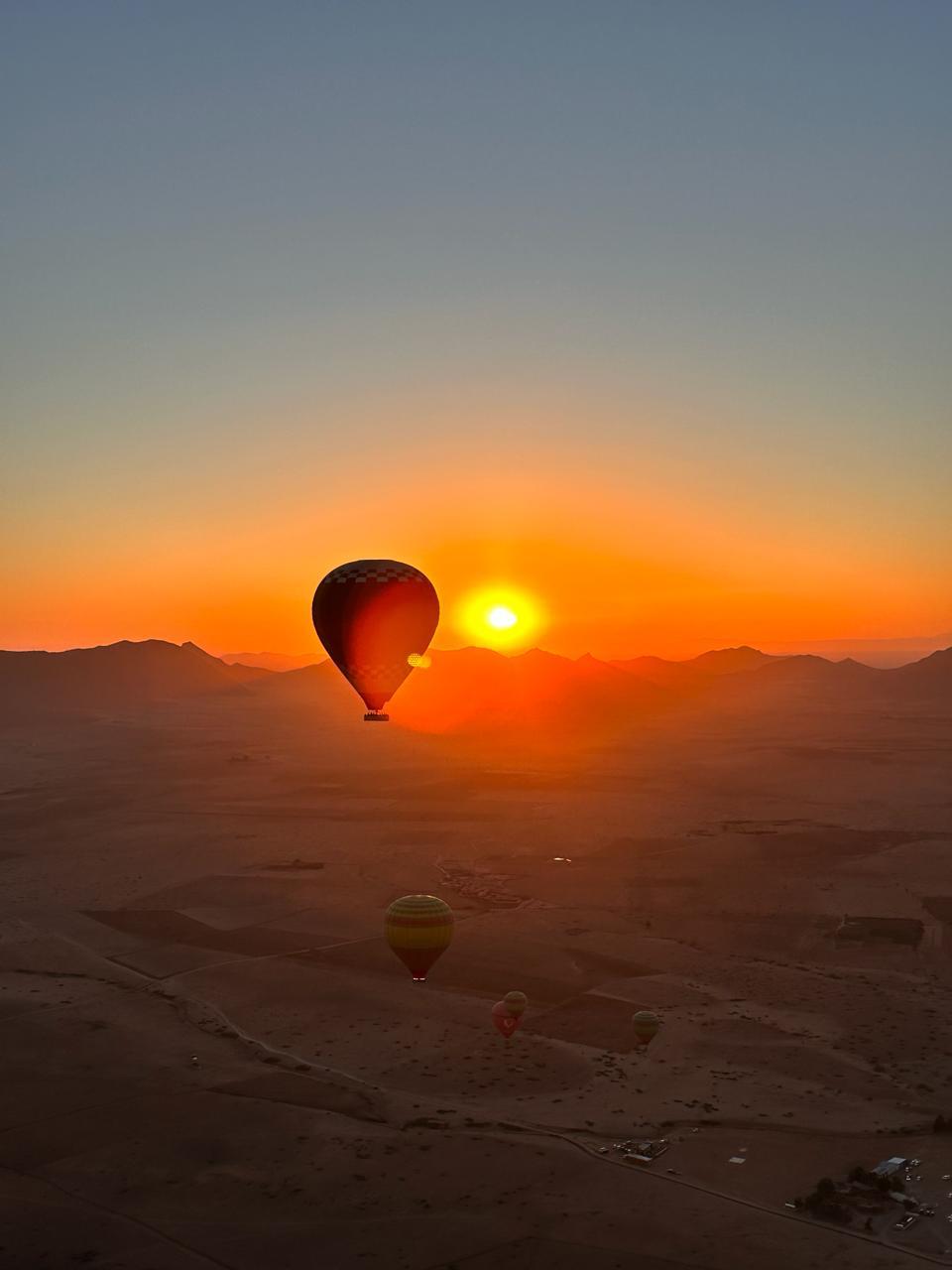 Hot air balloon sunrise over Marrakech